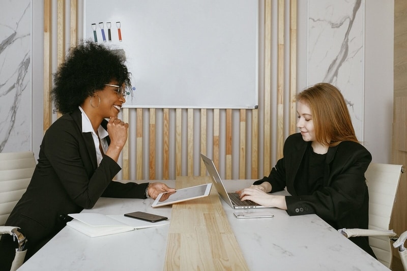 Student consulting with a counsellor on her university application.