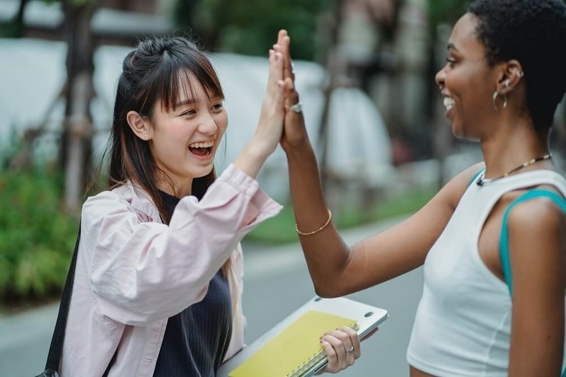 Student celebrating getting a scholarship for MBBS abroad.